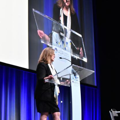 woman speaking at meeting